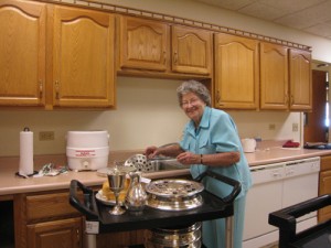 Later, Jeanne cleaned up after communion.